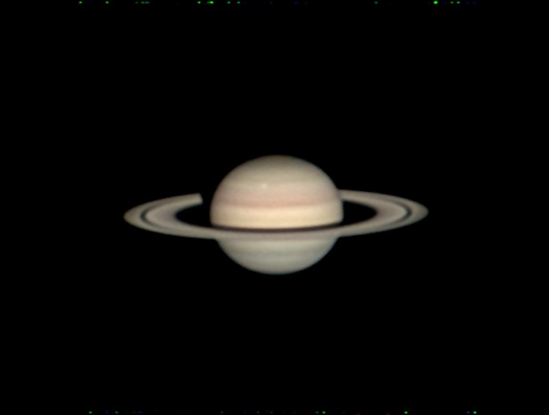 Saturn with white storm