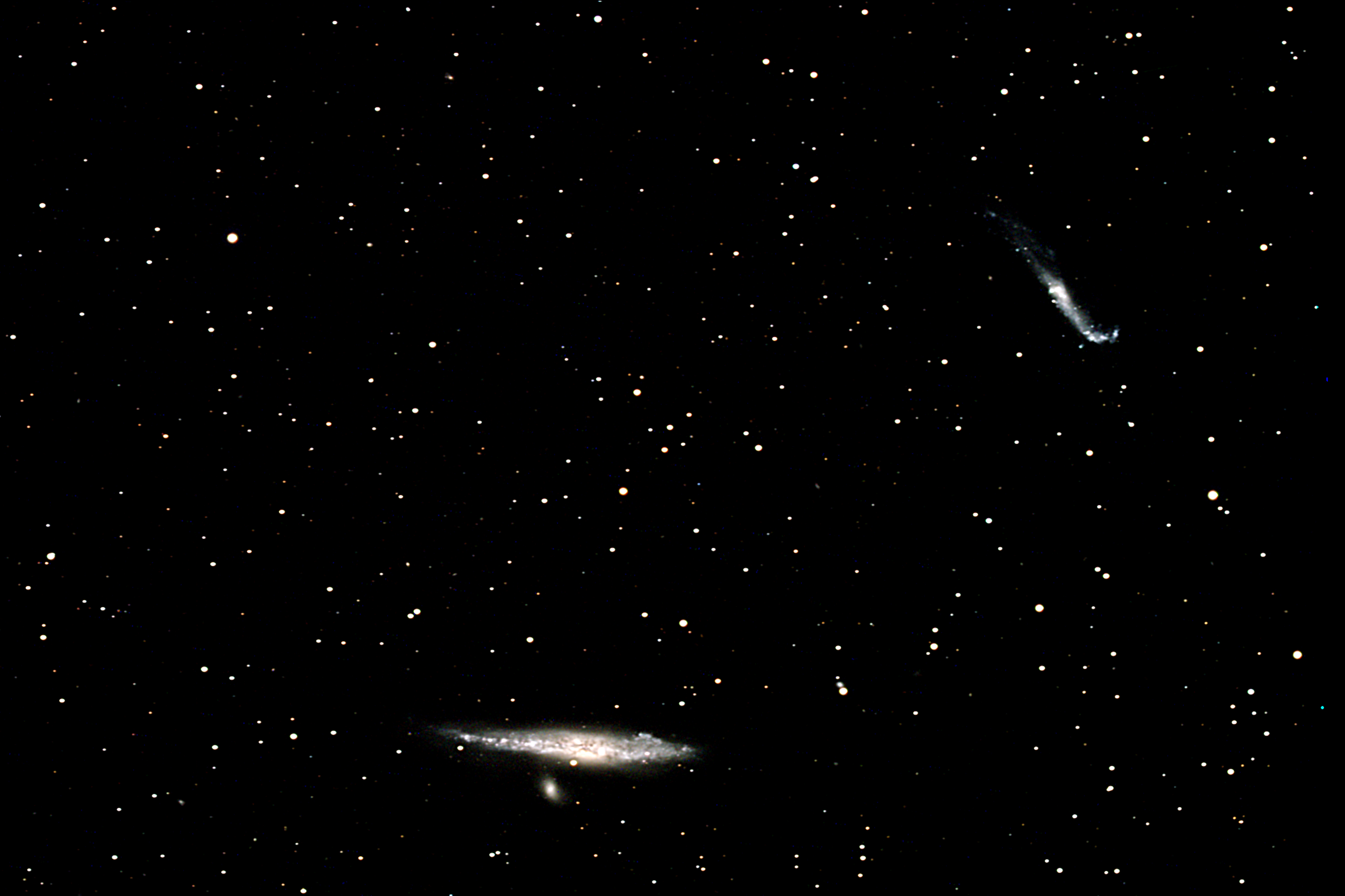 The Whale & Pup and the Hockeystick Galaxy