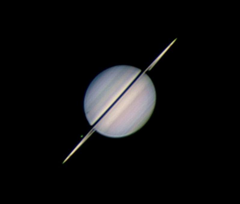 Saturn, Rhea and its shadow