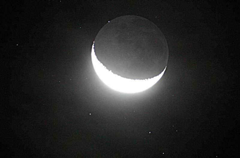 Atlas Setting Behind Moon