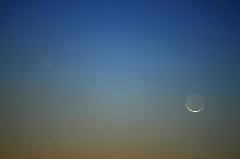 Comet PanSTARRS & New Moon image