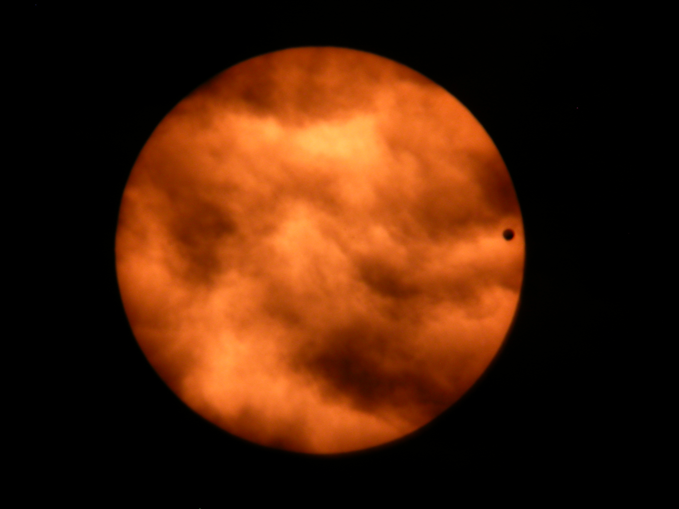 Venus Transit in the Clouds